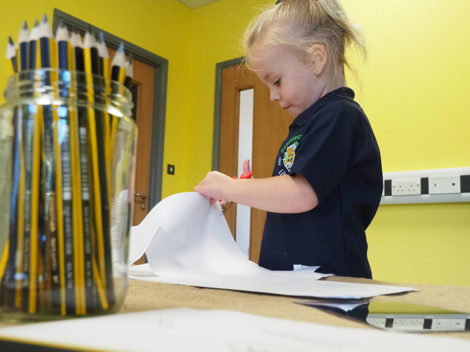 A child cutting paper